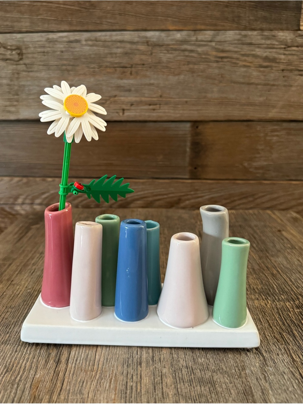Chive Pooley ceramic bud vase featuring eight distinct tubes in various colors